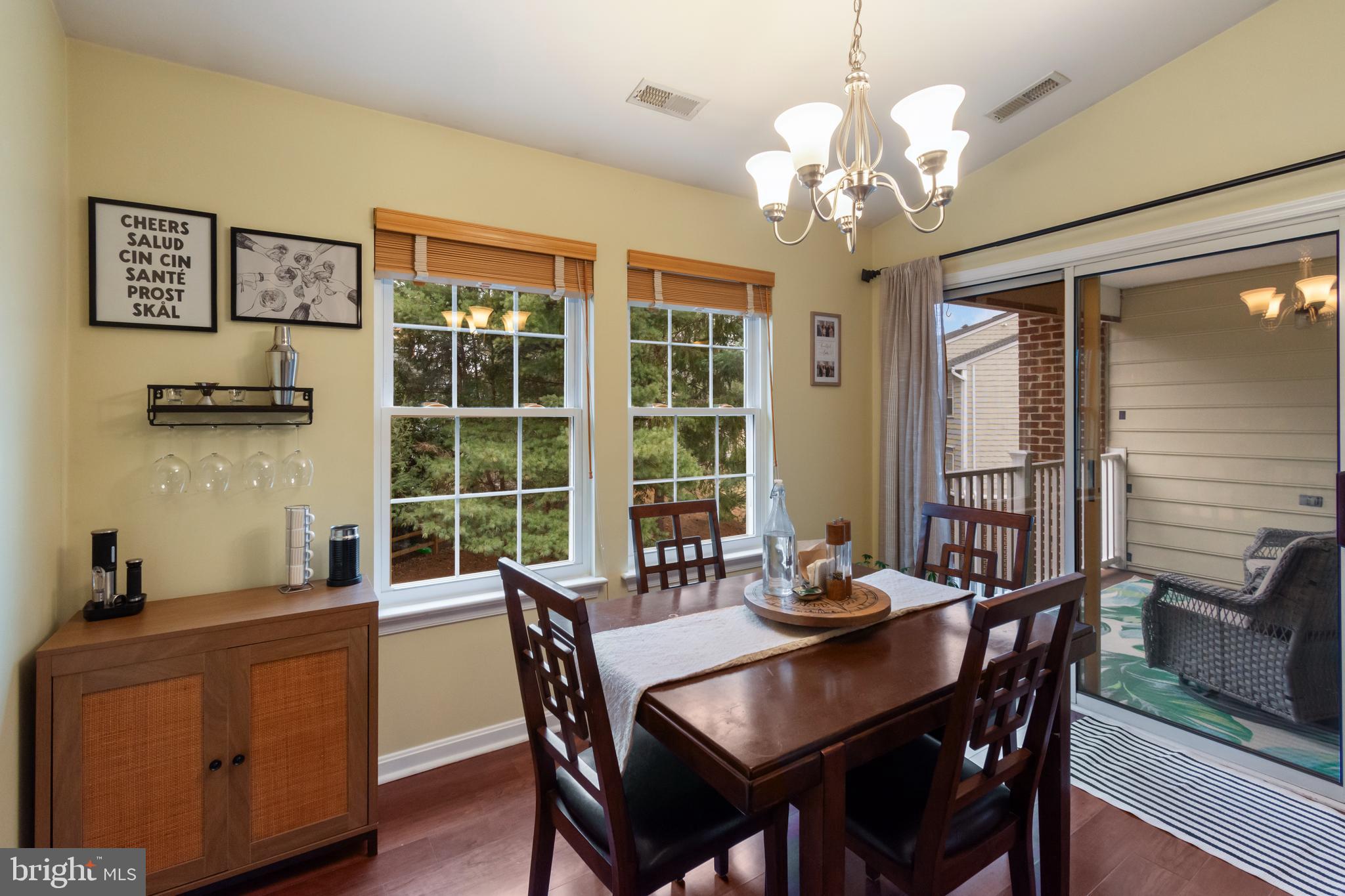 2406 Ellsworth Way, Unit 3B Frederick, MD 21702 - Photo 10 of 27 Dining area with slider to outdoor deck
