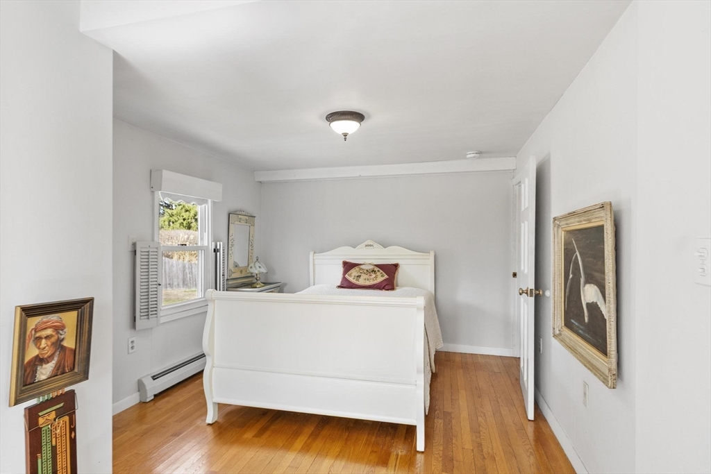 156 R North Street Medfield, MA 02052 - Photo 11 of 17 a view of a bedroom with wooden floor and cabinet