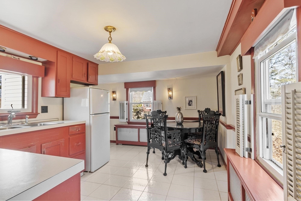 156 R North Street Medfield, MA 02052 - Photo 14 of 17 a view of a dining room with furniture window and outside view