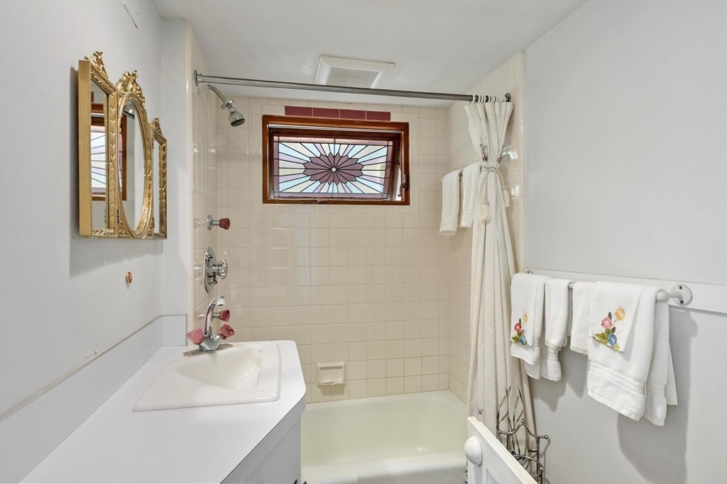 156 R North Street Medfield, MA 02052 - Photo 9 of 17 a white bath tub sitting next to a white sink