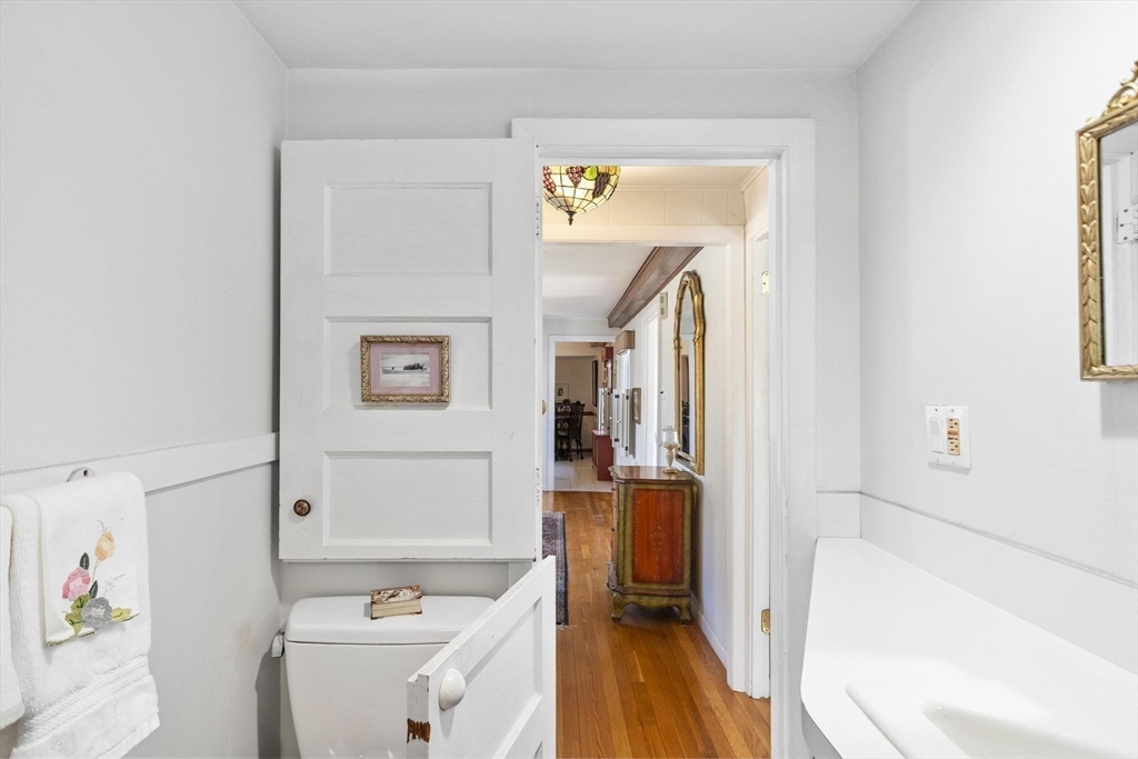 156 R North Street Medfield, MA 02052 - Photo 10 of 17 a bathroom with a tub sink and mirror
