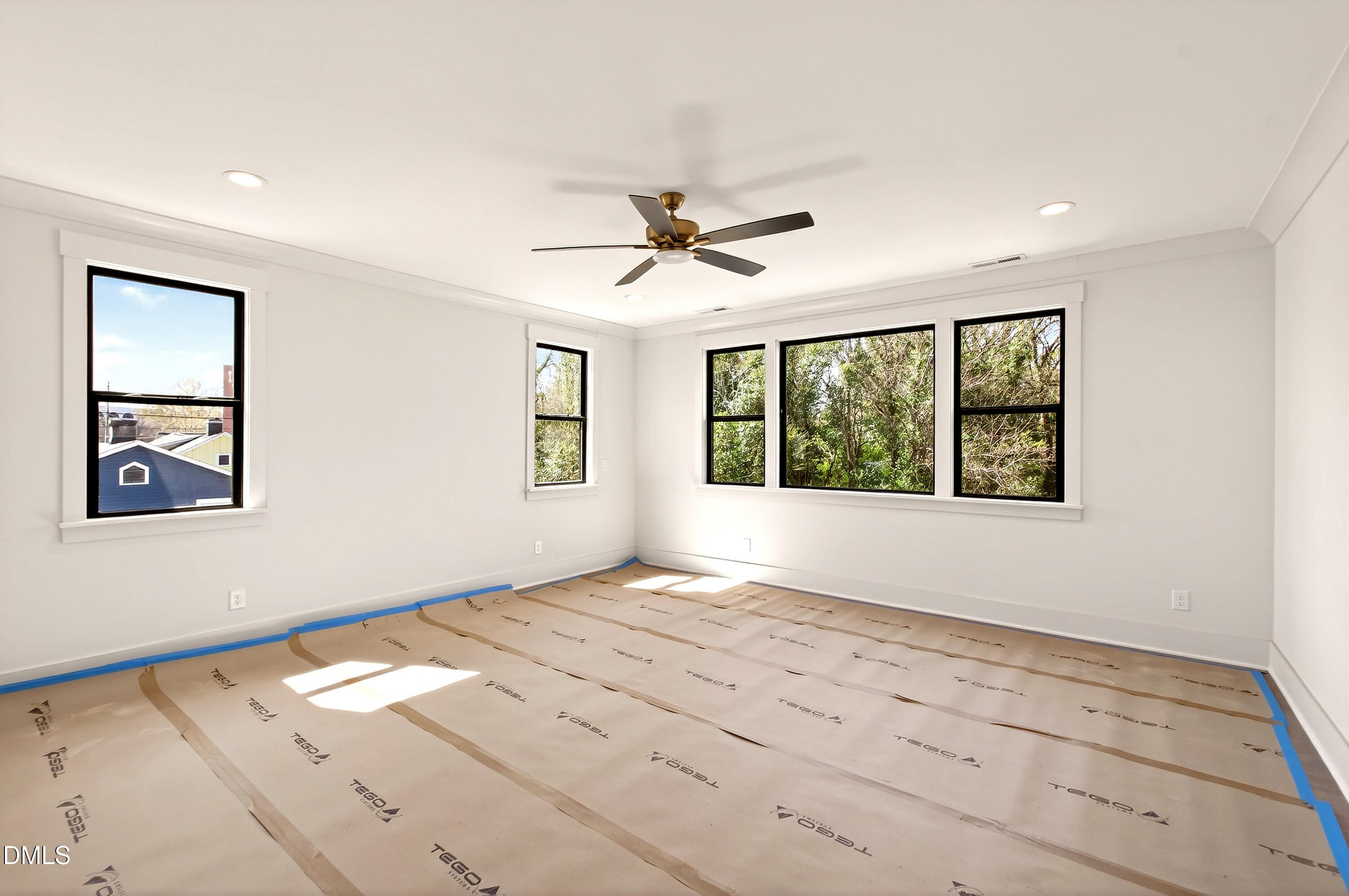 909 Oberlin Road Raleigh, NC 27605 - Photo 19 of 59 a view of an empty room with a window