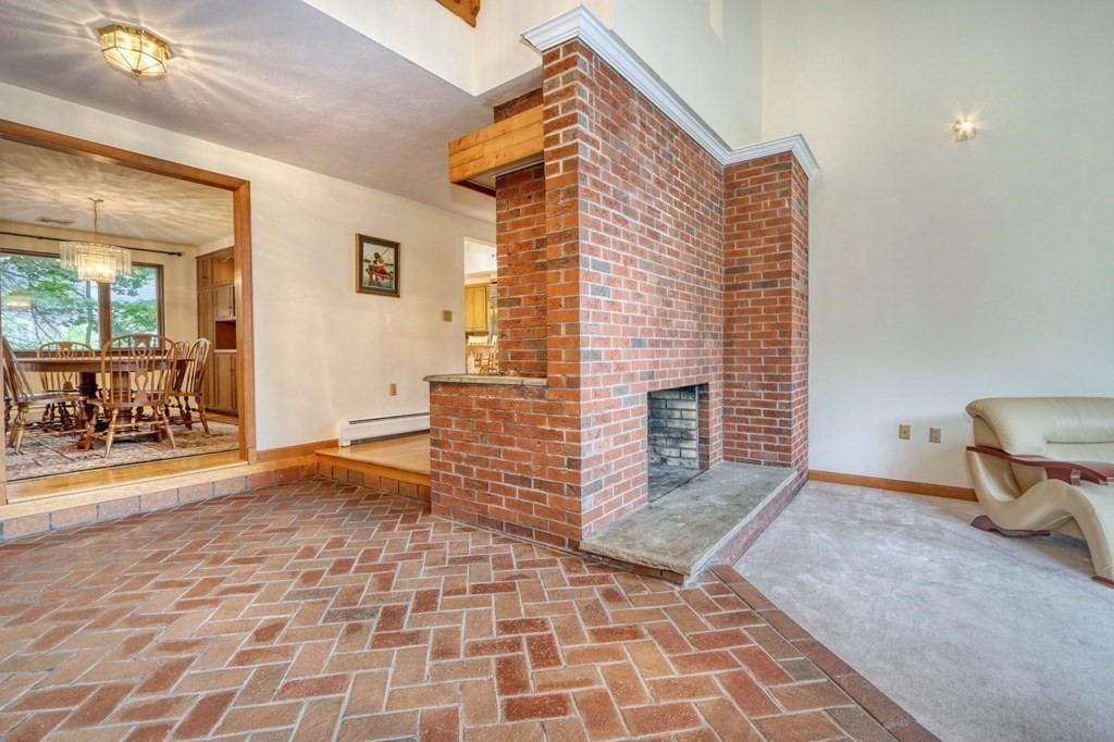 11 Viking Road Winchester, MA 01890 - Photo 12 of 41 a view of a patio with a table and chairs