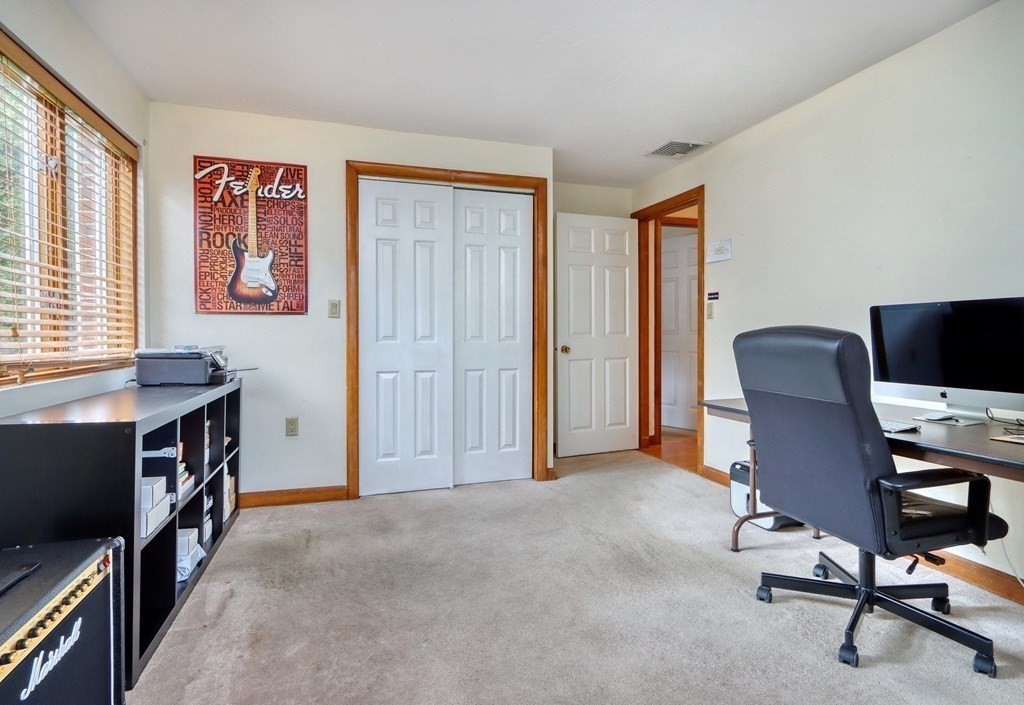 11 Viking Road Winchester, MA 01890 - Photo 20 of 41 a view of a workspace with furniture and a window