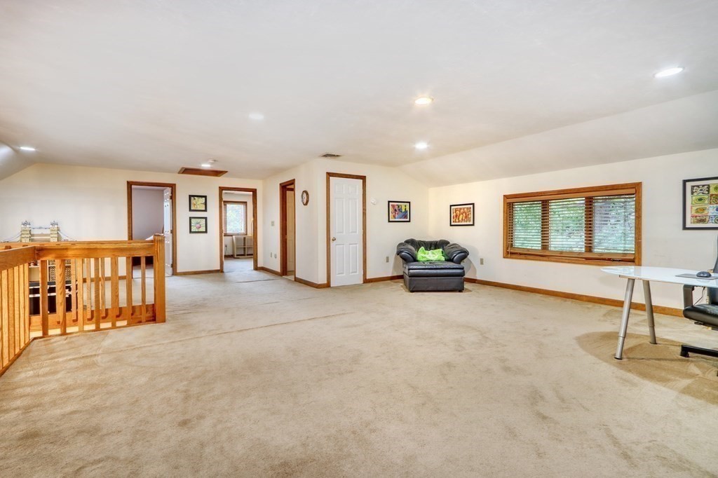 11 Viking Road Winchester, MA 01890 - Photo 24 of 41 a living room with furniture and a table