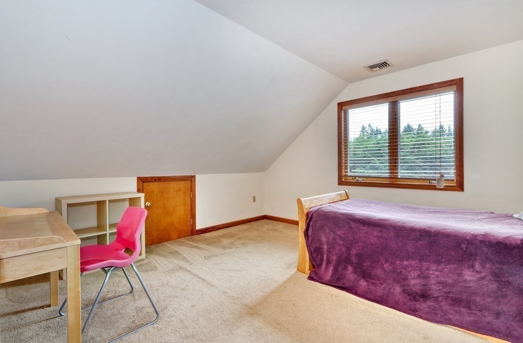 11 Viking Road Winchester, MA 01890 - Photo 26 of 41 a bedroom with a bed and window