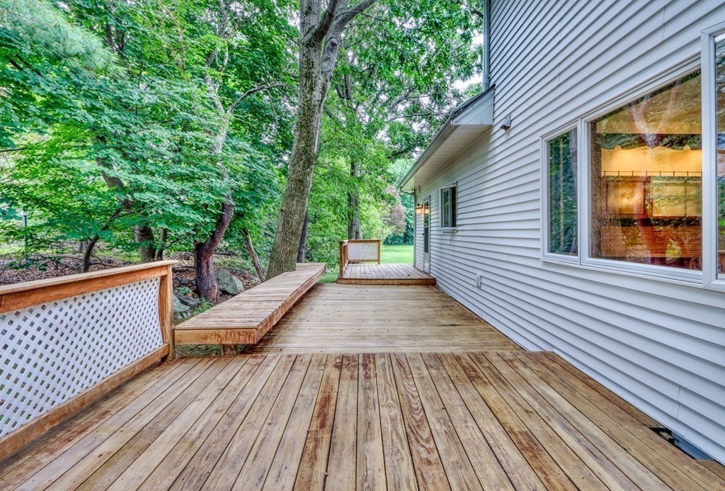 11 Viking Road Winchester, MA 01890 - Photo 34 of 41 a view of a wooden deck with a yard