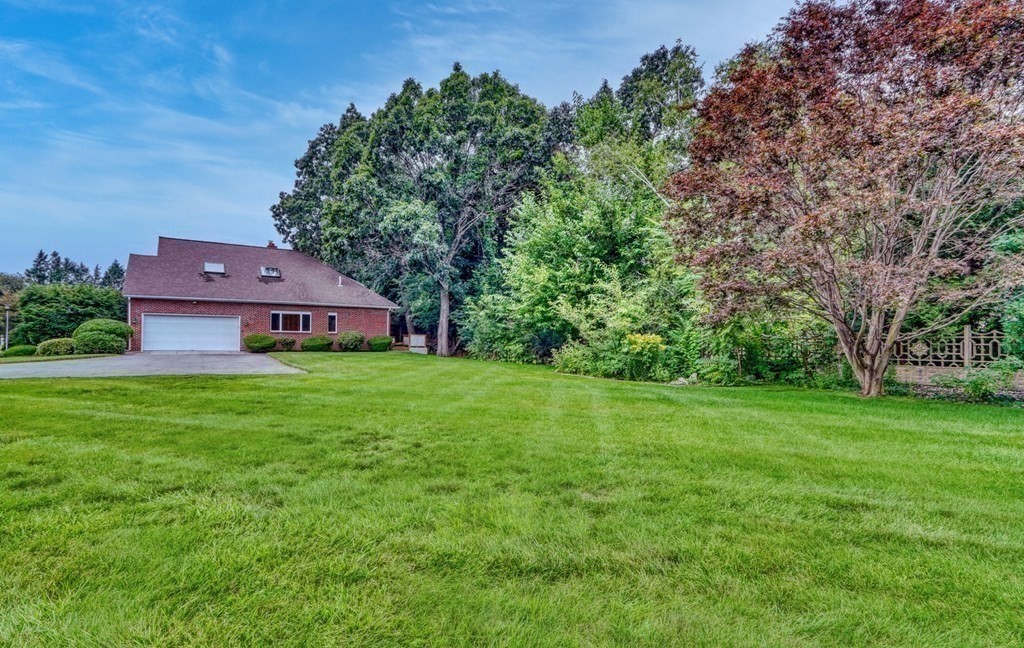 11 Viking Road Winchester, MA 01890 - Photo 38 of 41 a view of a house with a big yard