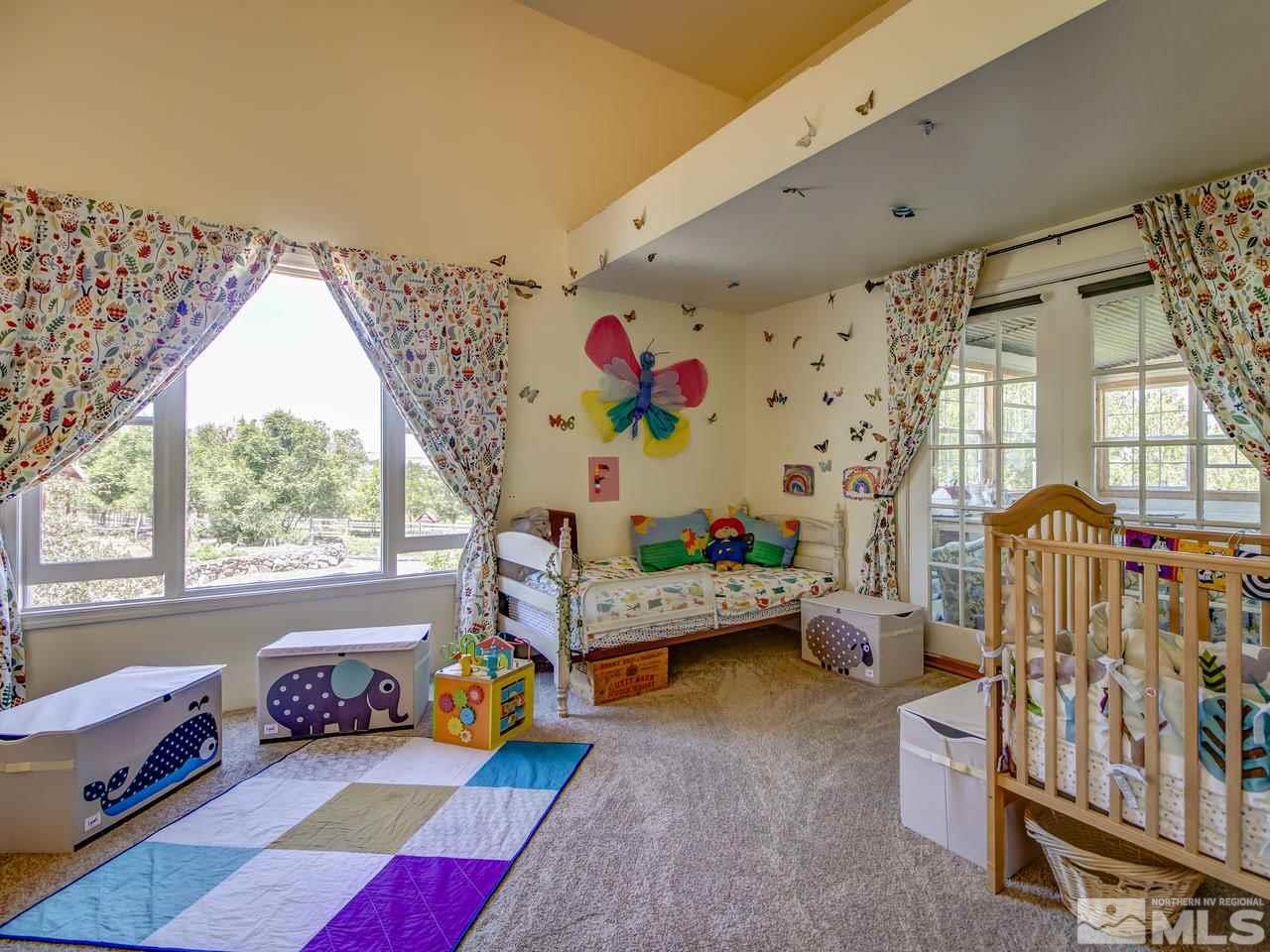 4045 Fairview Road Reno, NV 89511 - Photo 13 of 24 a bedroom with furniture and a window