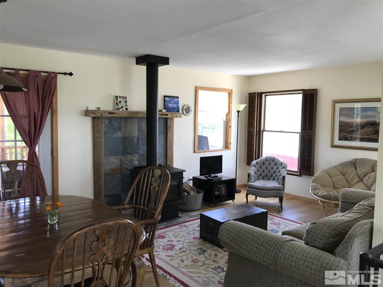 4045 Fairview Road Reno, NV 89511 - Photo 17 of 24 a living room with furniture and a large window