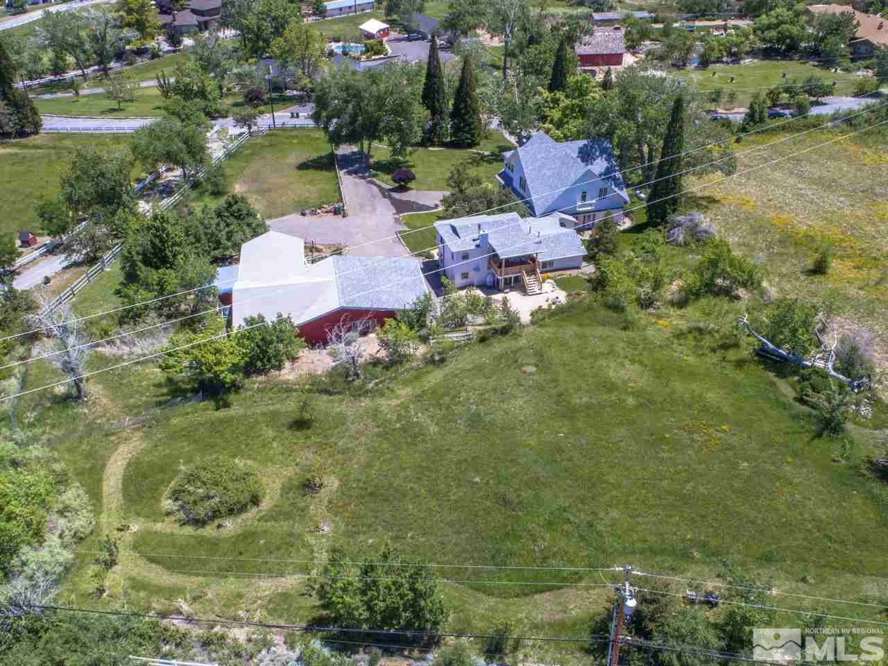4045 Fairview Road Reno, NV 89511 - Photo 23 of 24 an aerial view of a house with outdoor space and lake view