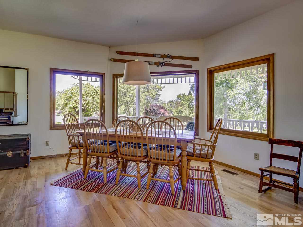 4045 Fairview Road Reno, NV 89511 - Photo 6 of 24 a dining room with furniture window wooden floor