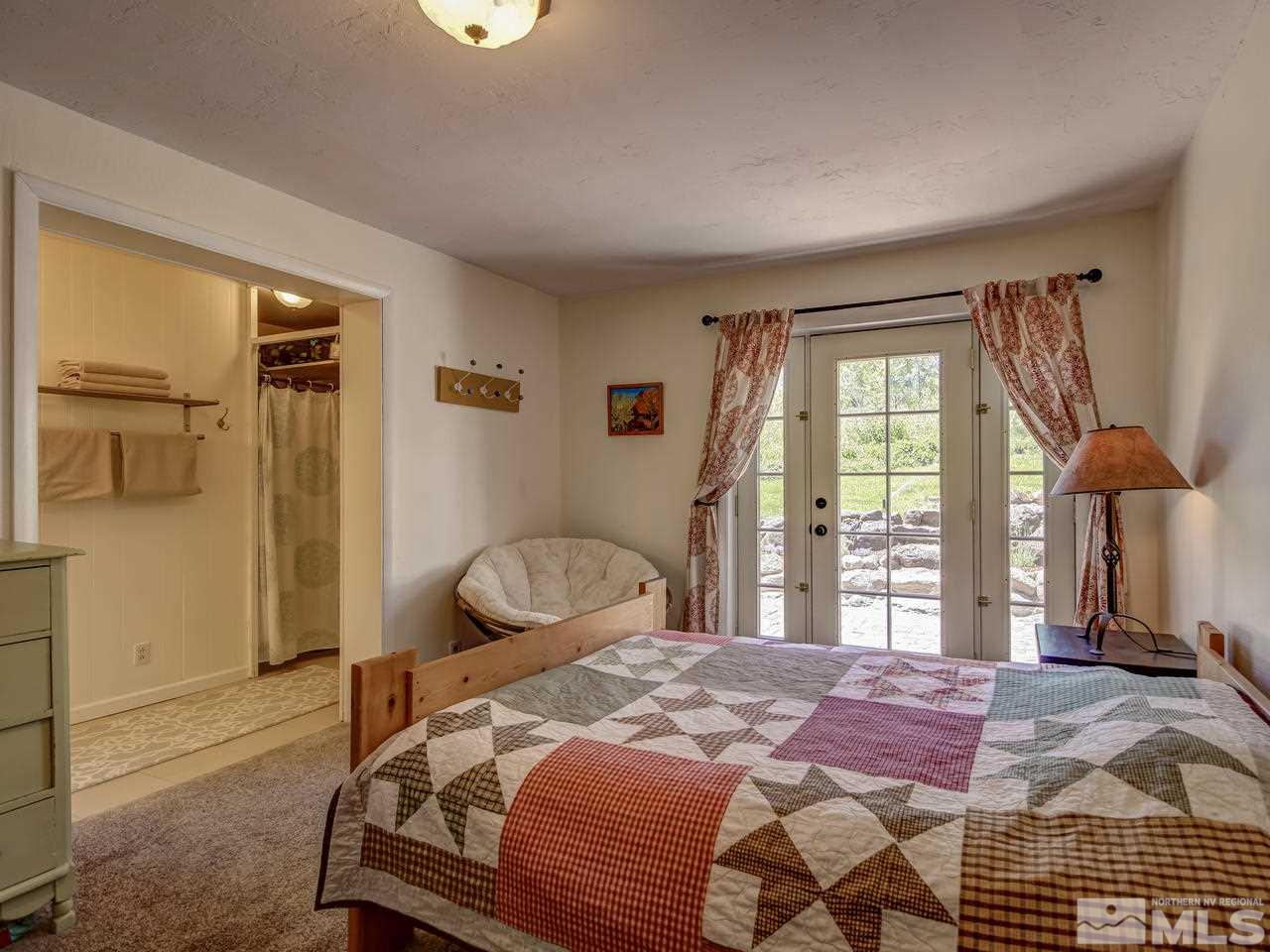 4045 Fairview Road Reno, NV 89511 - Photo 9 of 24 a bedroom with a bed and a window