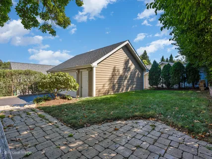 a view of a backyard with garden
