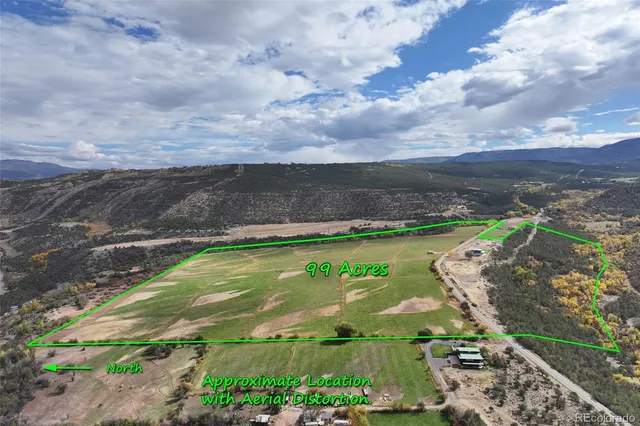 a view of a lake with a yard