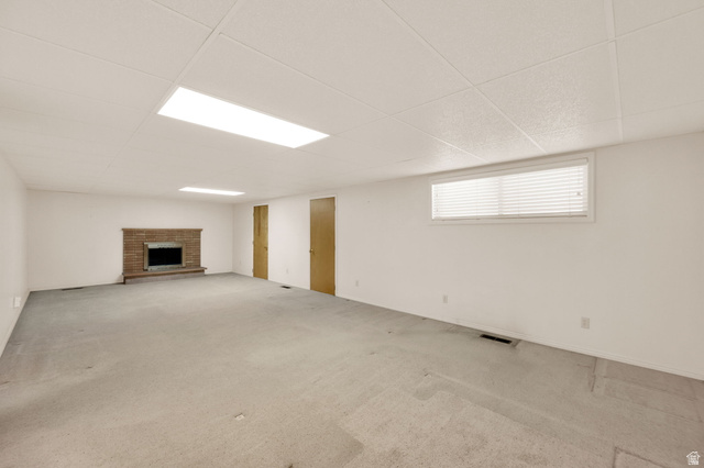 1783 South 500 East Bountiful, UT 84010 - Photo 15 of 30 Spacious room featuring a brick-surround fireplace