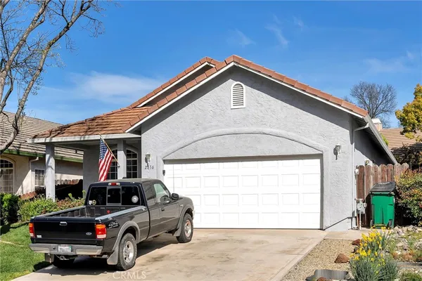a car parked in front of a house