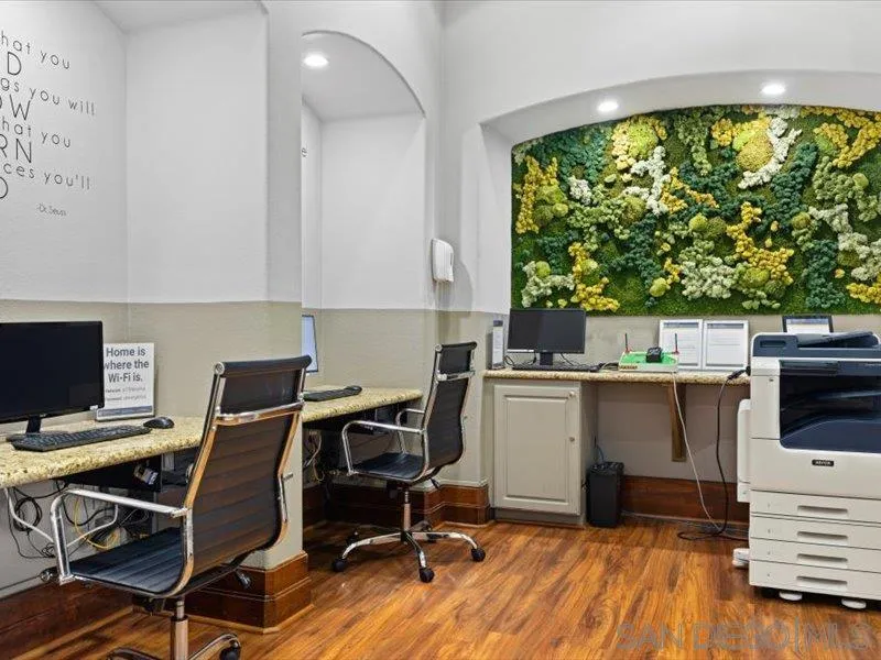 9237 Regents Road, Unit K101 La Jolla, CA 92037 - Photo 24 of 29 a view of workspace with wooden floor windows