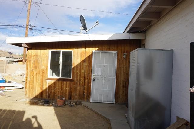 44822 Genoa Avenue Lancaster, CA 93534 - Photo 19 of 27 a view of front door of house