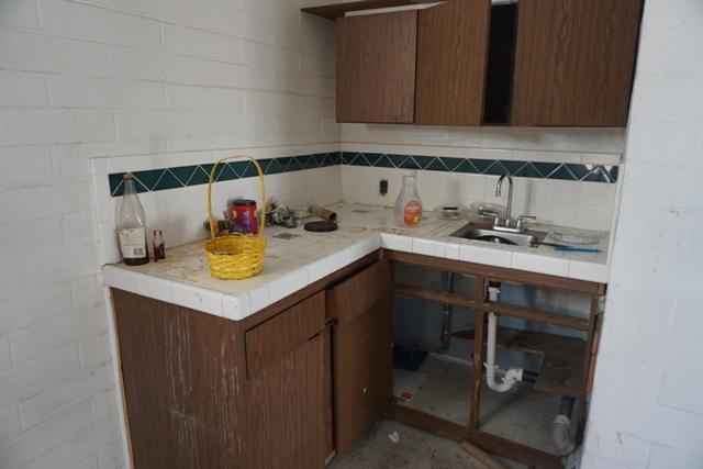44822 Genoa Avenue Lancaster, CA 93534 - Photo 25 of 27 a bathroom with a sink and a cabinets