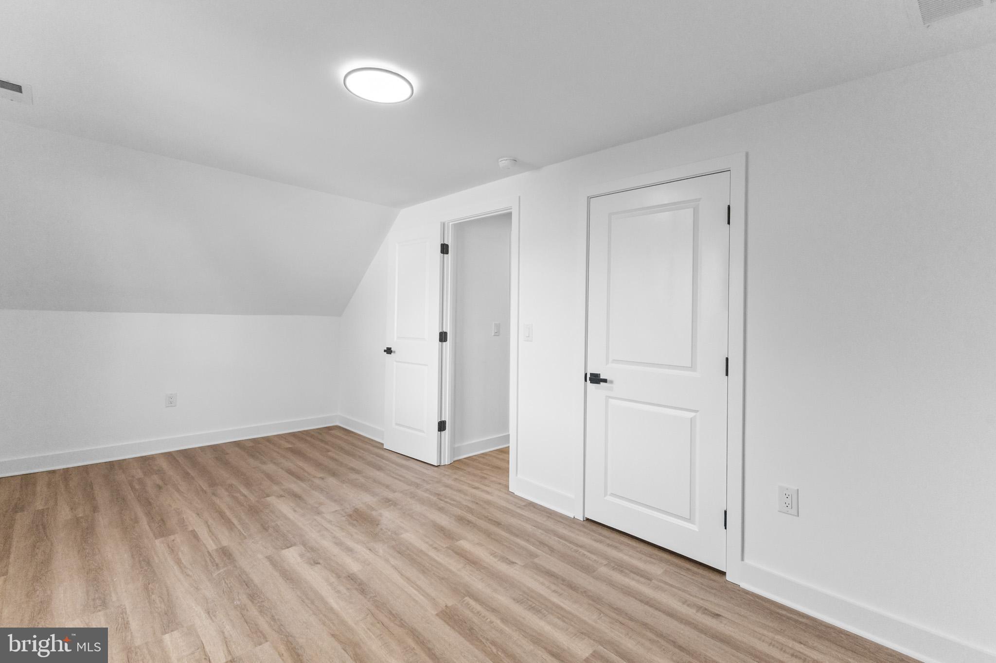 5 Perennial Lane Willingboro, NJ 08046 - Photo 27 of 52 a view of an empty room with wooden floor