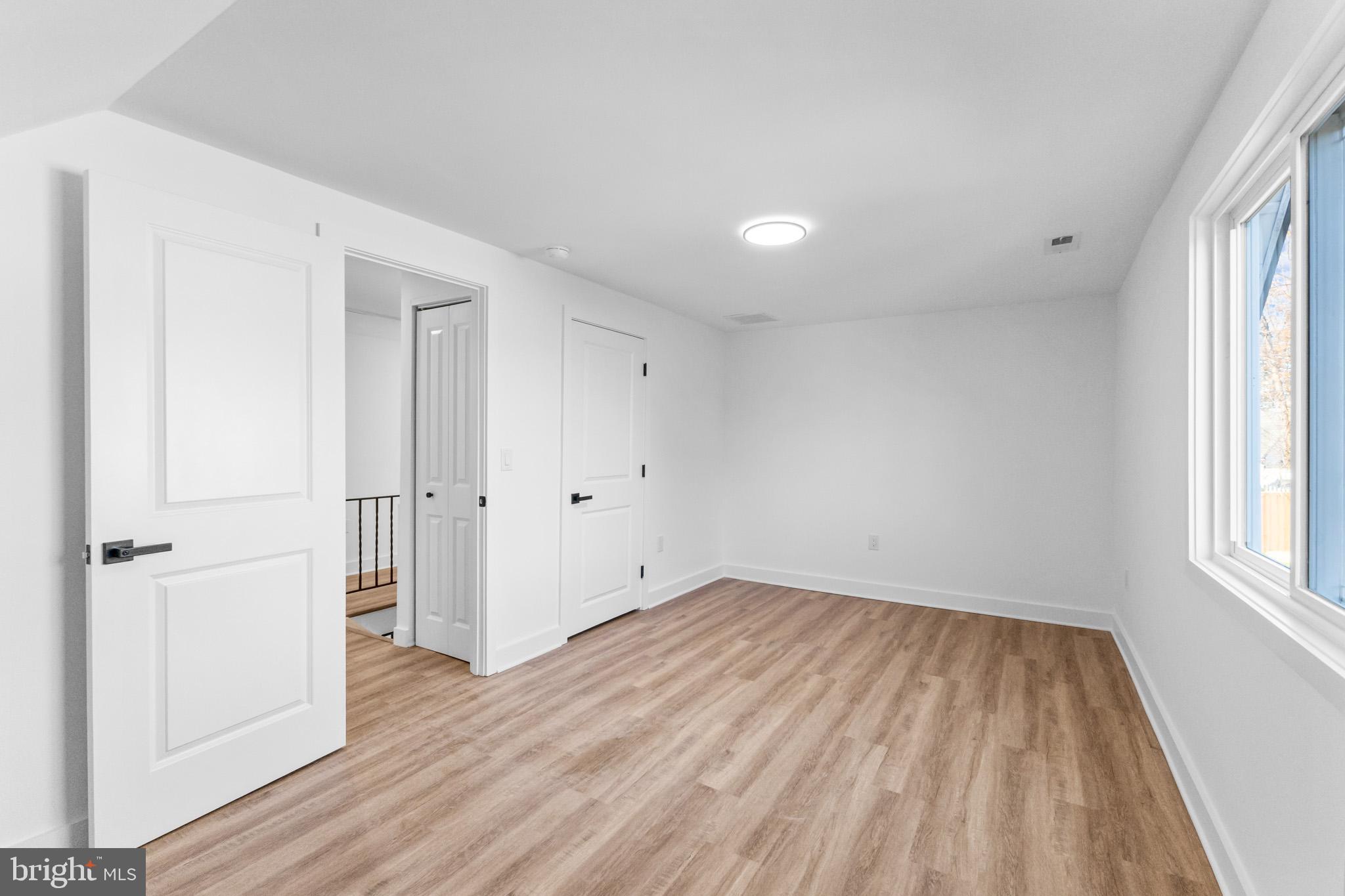 5 Perennial Lane Willingboro, NJ 08046 - Photo 28 of 52 wooden floor in an empty room with a window