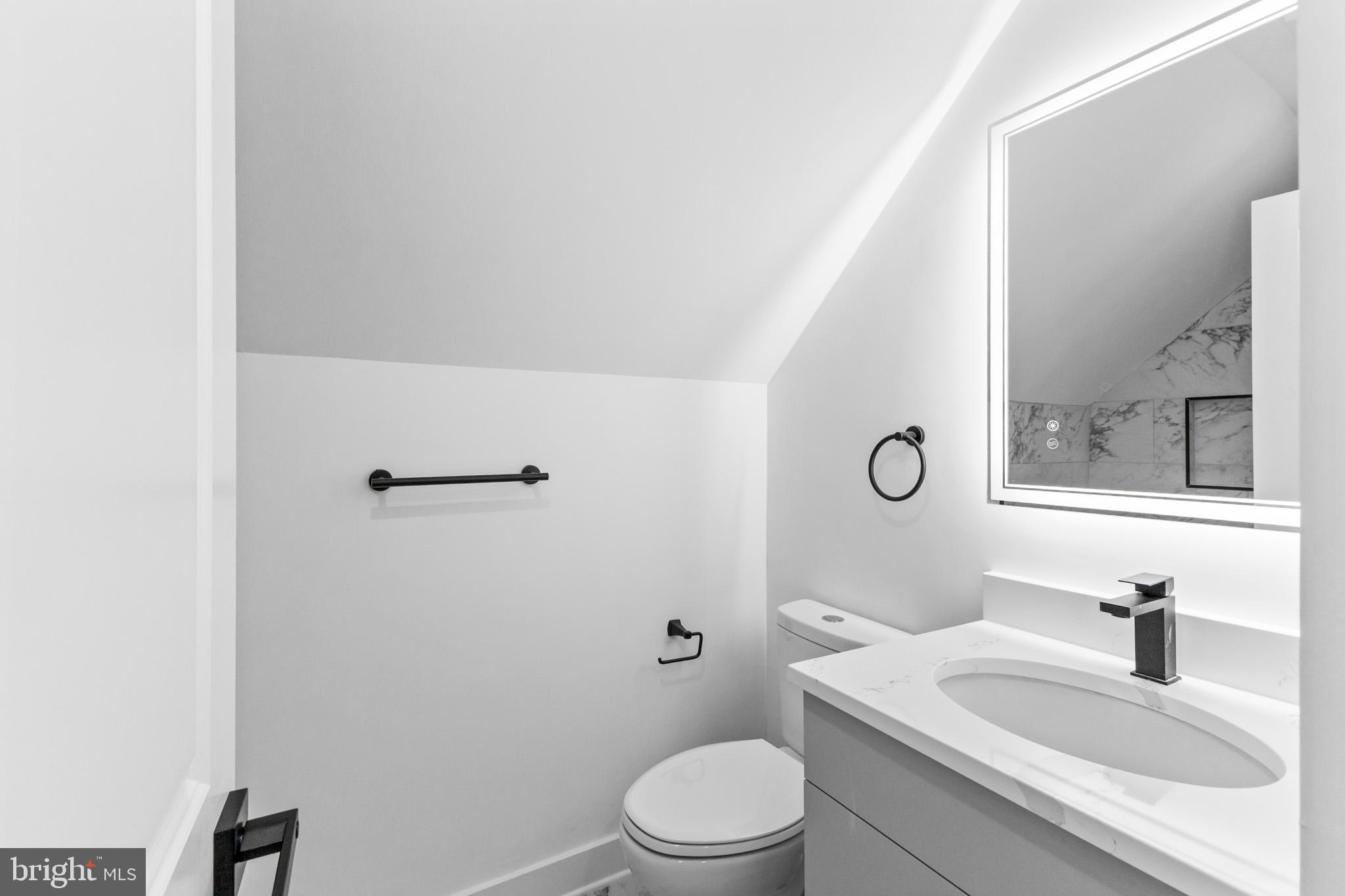 5 Perennial Lane Willingboro, NJ 08046 - Photo 29 of 52 a bathroom with a sink toilet vanity and tub