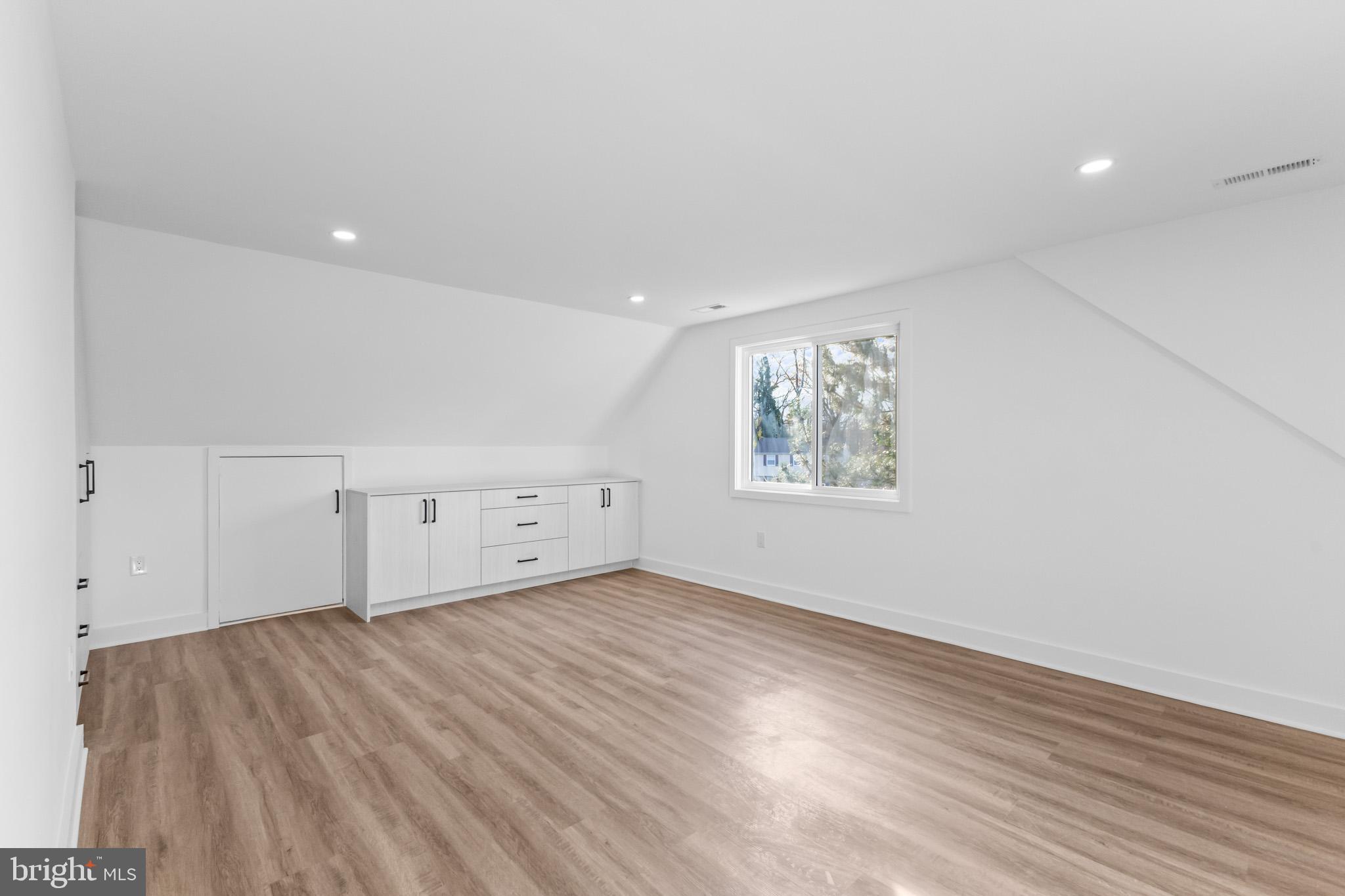 5 Perennial Lane Willingboro, NJ 08046 - Photo 30 of 52 an empty room with wooden floor and windows