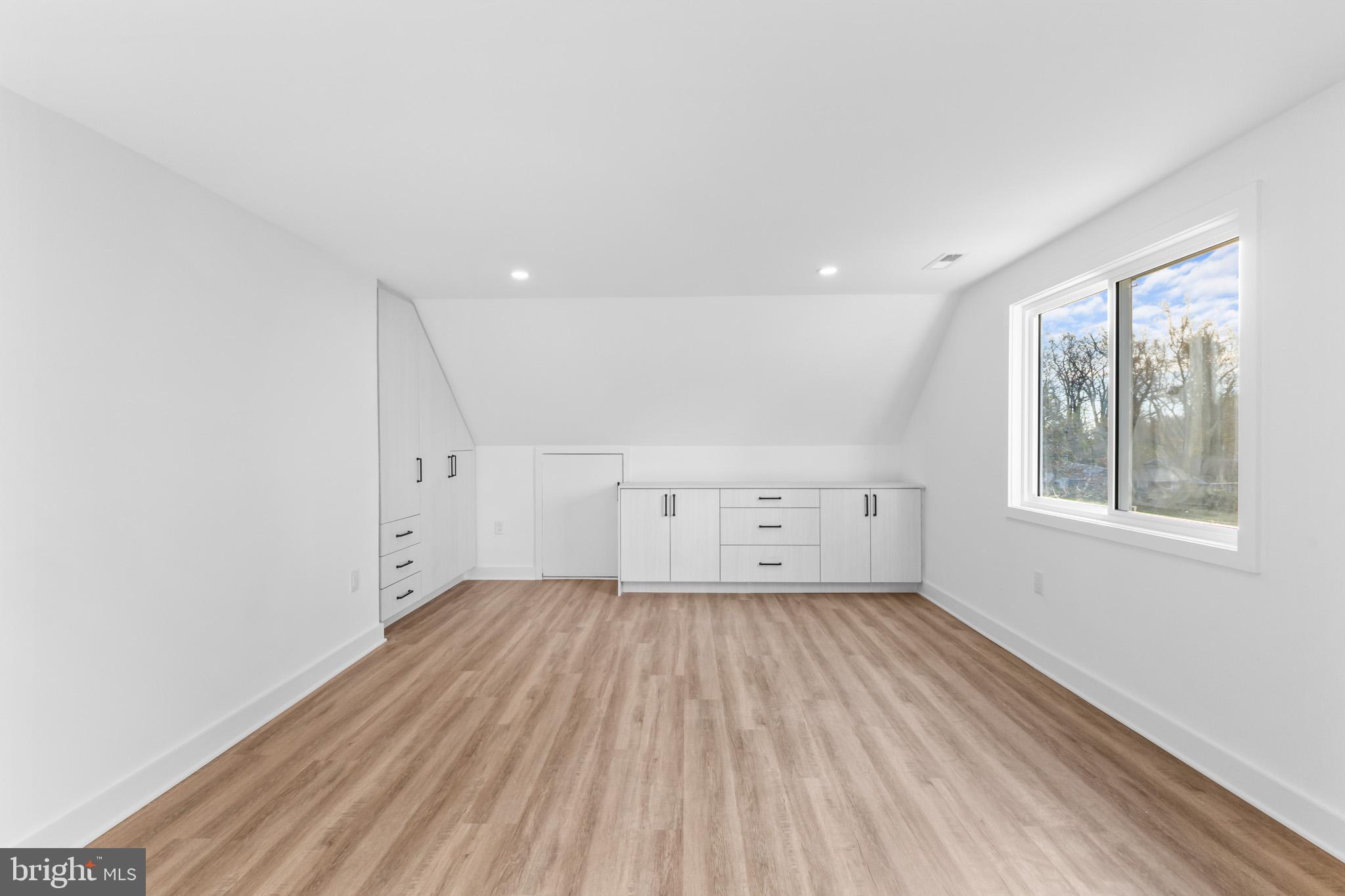 5 Perennial Lane Willingboro, NJ 08046 - Photo 31 of 52 an empty room with wooden floor and windows