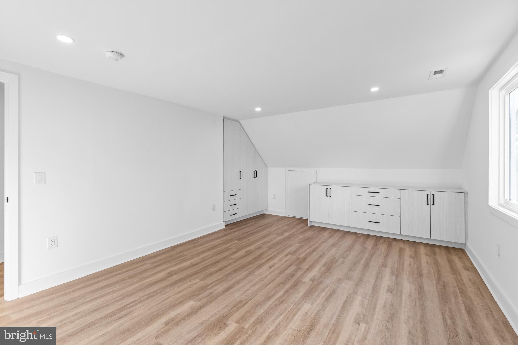 5 Perennial Lane Willingboro, NJ 08046 - Photo 32 of 52 an empty room with wooden floor and windows