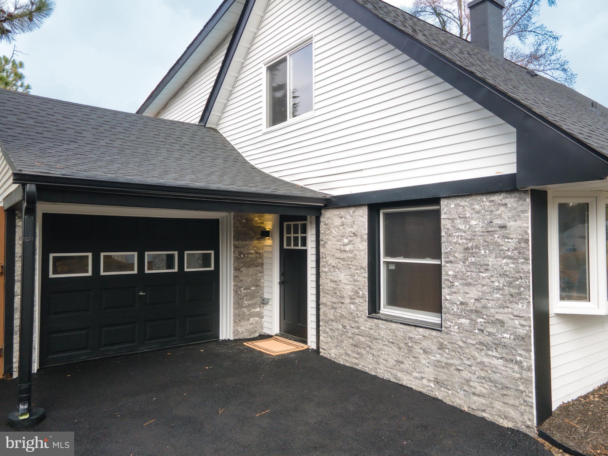 5 Perennial Lane Willingboro, NJ 08046 - Photo 4 of 52 a front view of a house with garage