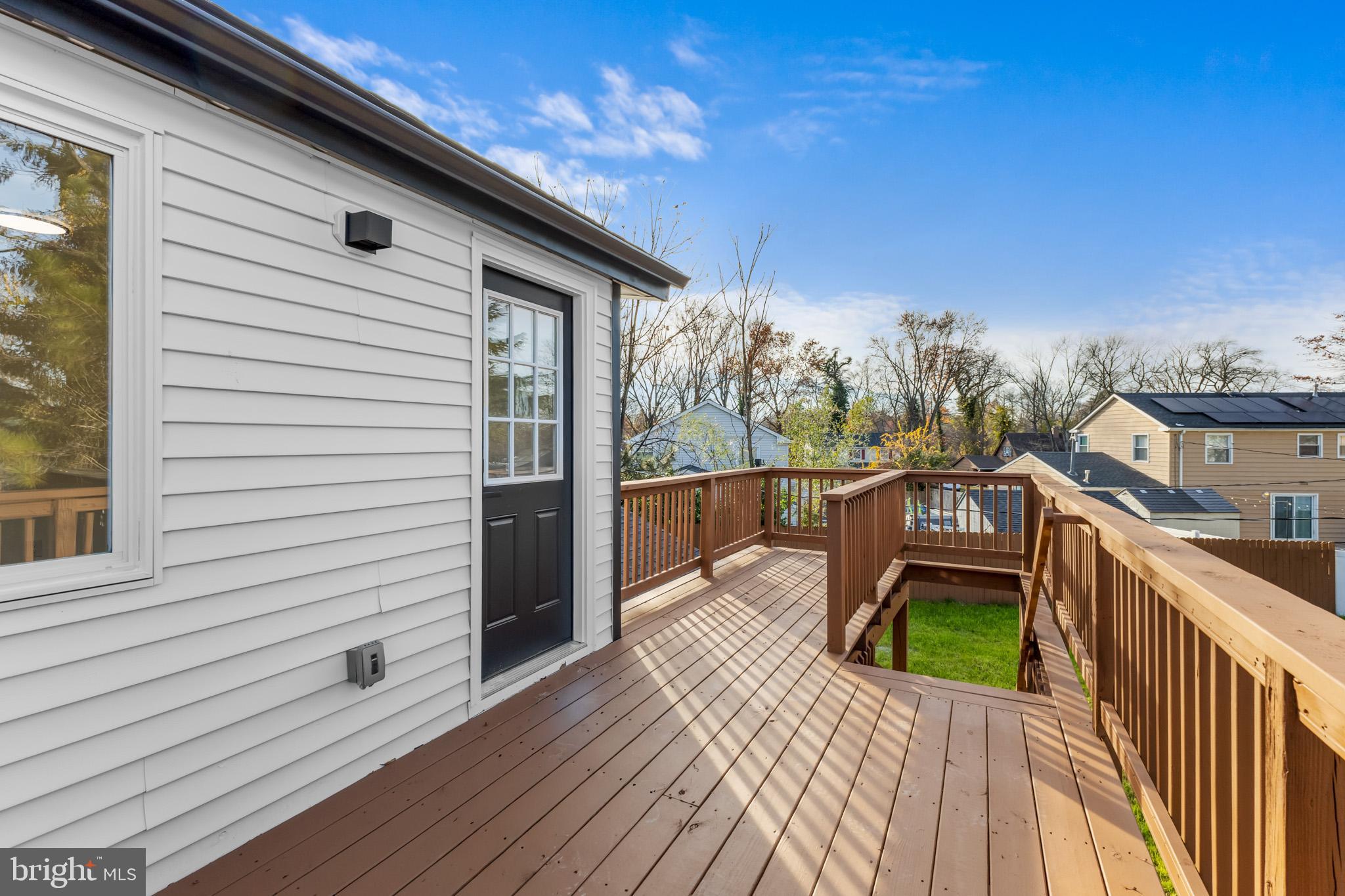 5 Perennial Lane Willingboro, NJ 08046 - Photo 42 of 52 a view of a balcony with wooden floor and fence