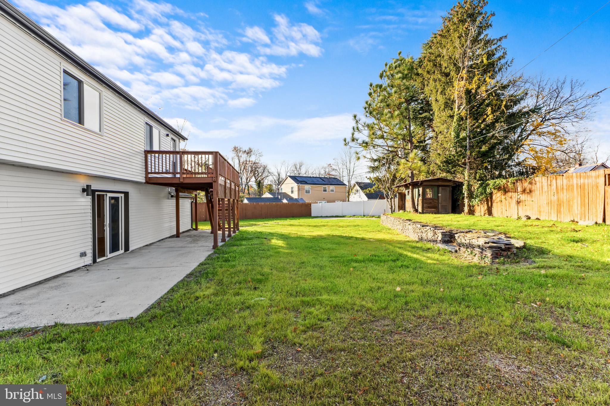5 Perennial Lane Willingboro, NJ 08046 - Photo 47 of 52 a view of a white house with a big yard and large tree