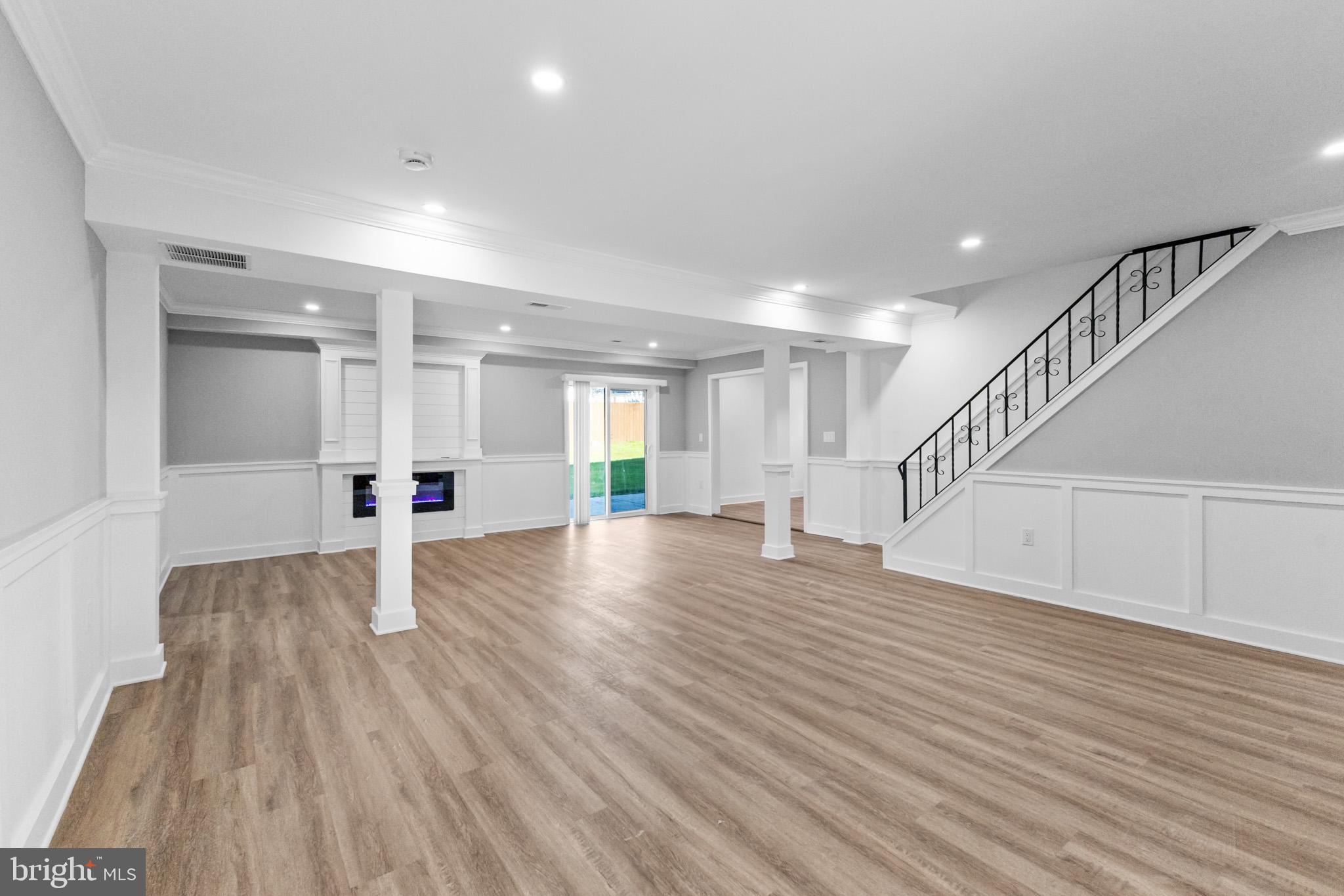 5 Perennial Lane Willingboro, NJ 08046 - Photo 5 of 52 a view of a room with wooden floors and stairs