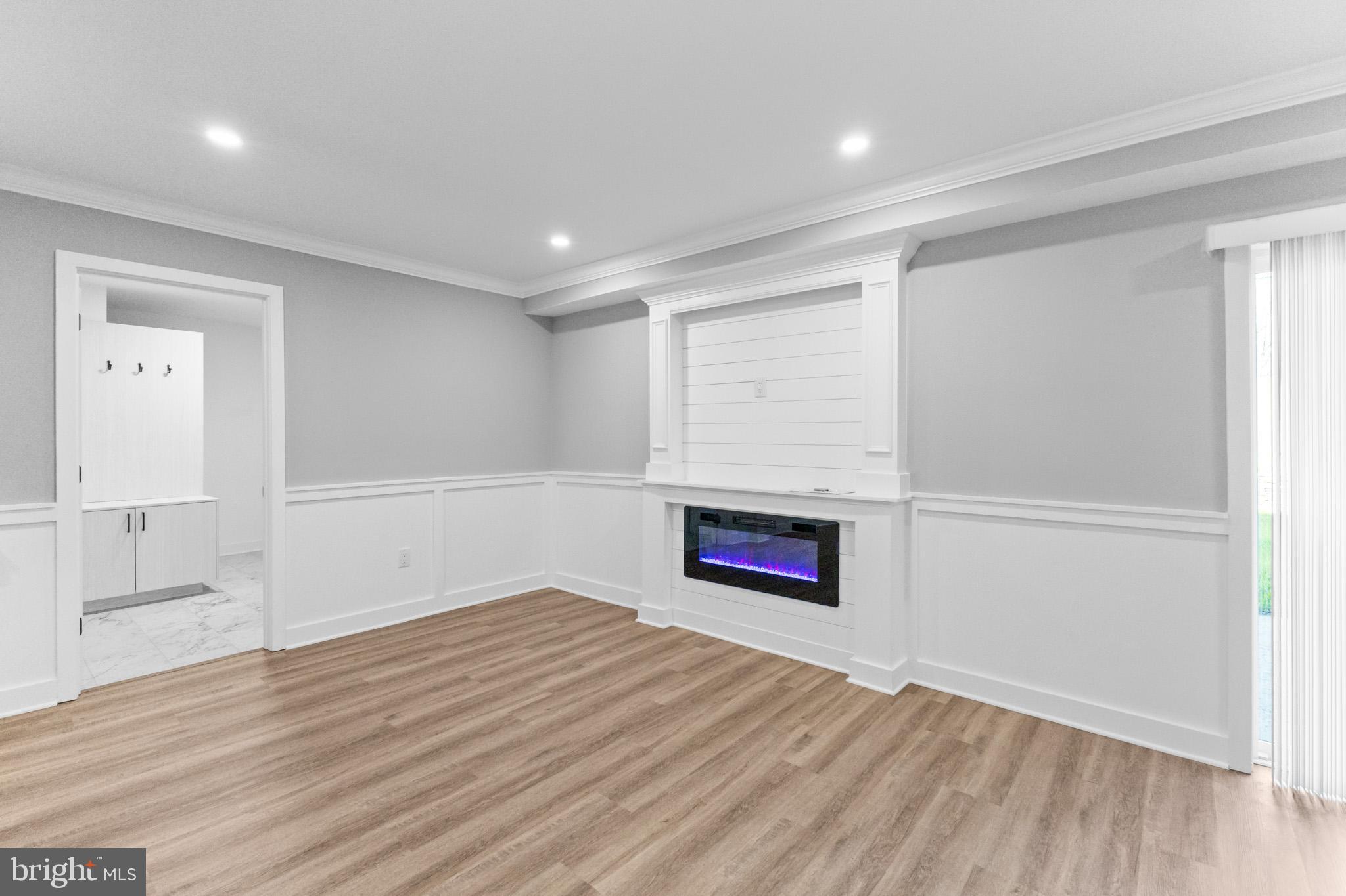 5 Perennial Lane Willingboro, NJ 08046 - Photo 7 of 52 an empty room with wooden floor and windows