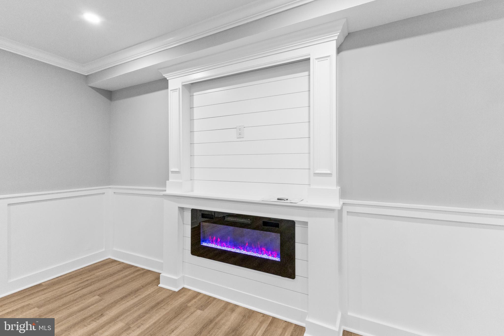 5 Perennial Lane Willingboro, NJ 08046 - Photo 8 of 52 a view of an empty room with wooden floor and a window