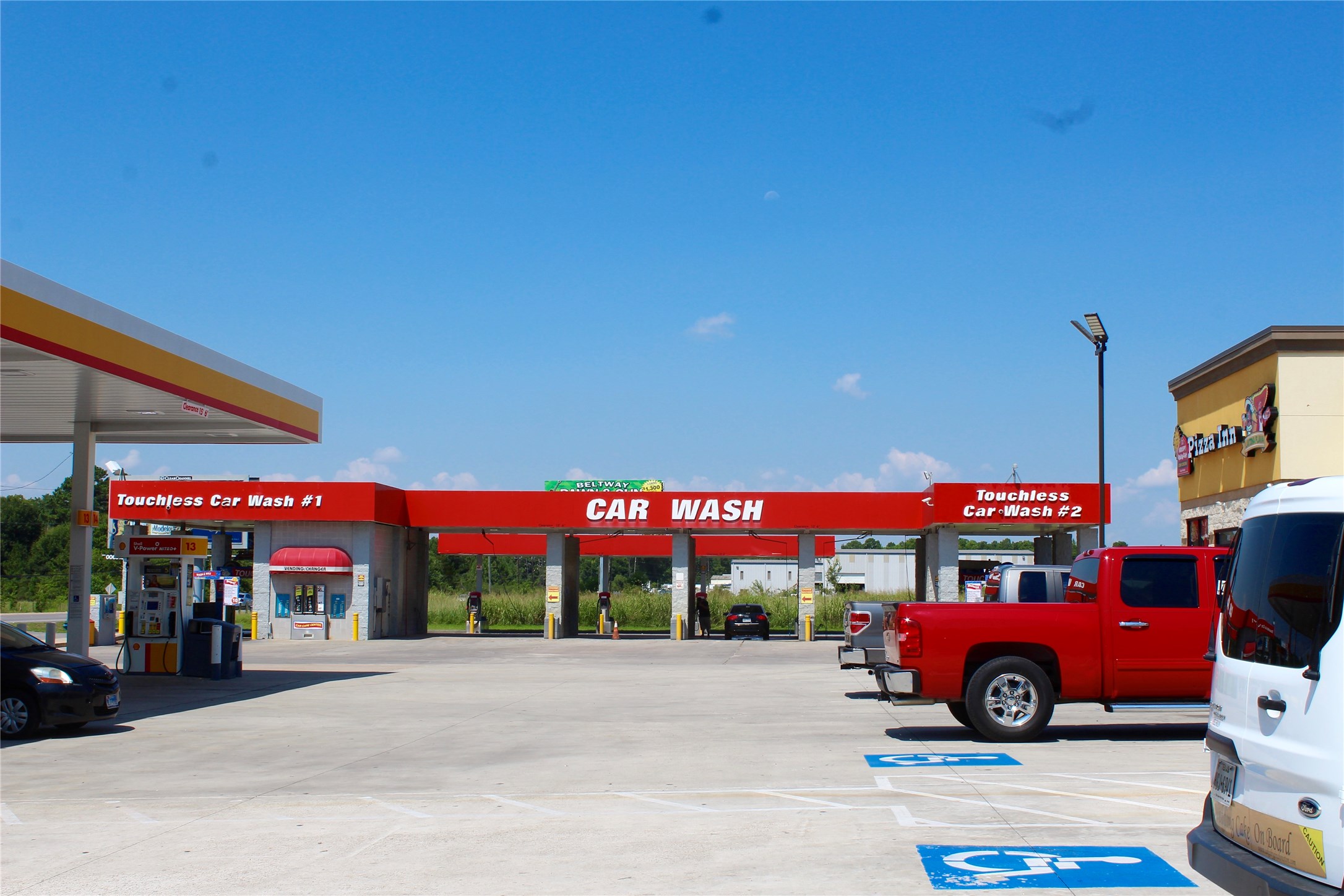 3000 Wilson Road Humble, TX 77396 - Photo 12 of 13 a view of outdoor space with truck parked