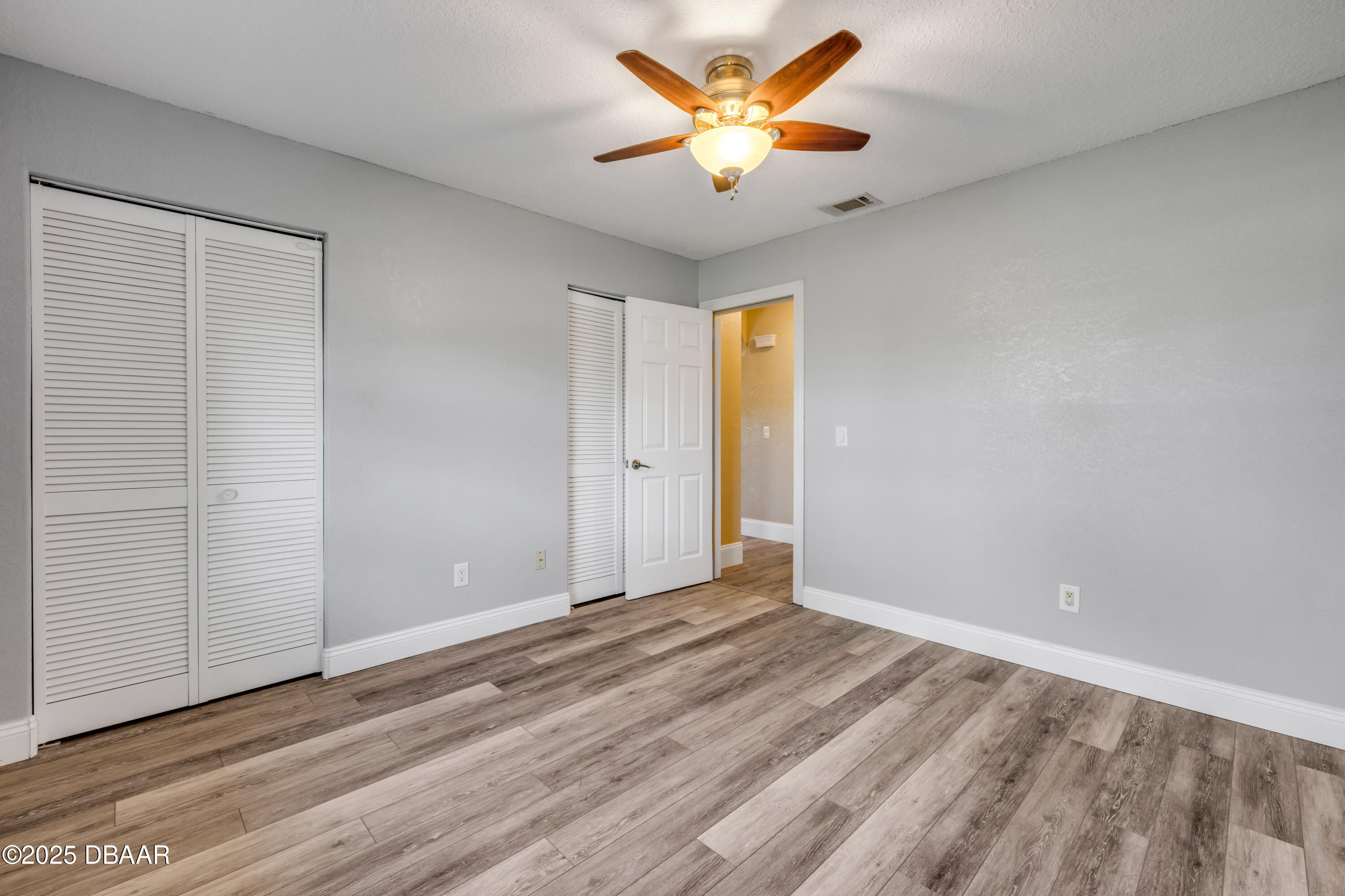 1617 Hontoon Road DeLand, FL 32720 - Photo 25 of 43 wooden floor in an empty room