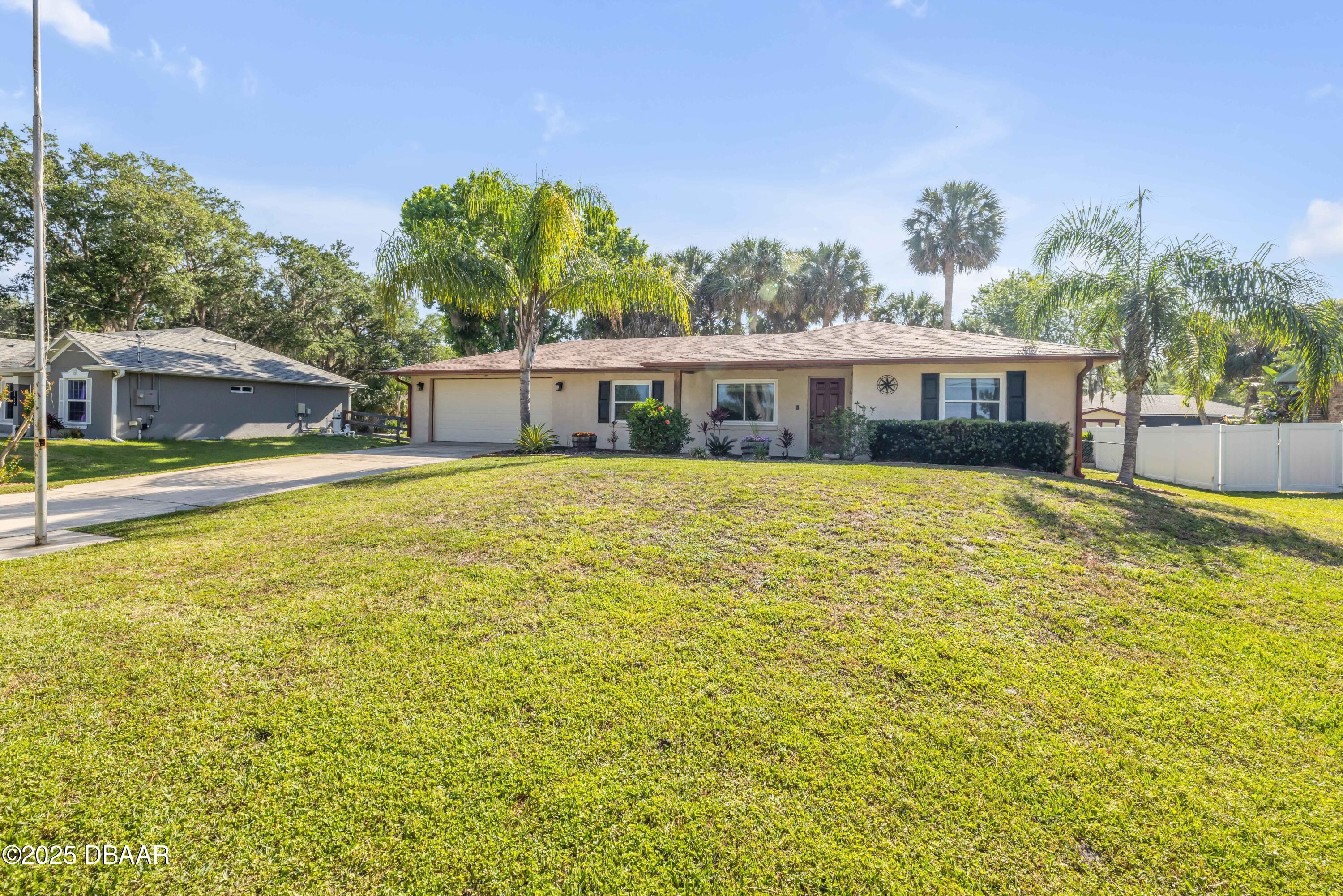 1617 Hontoon Road DeLand, FL 32720 - Photo 5 of 43 a view of a house with a swimming pool