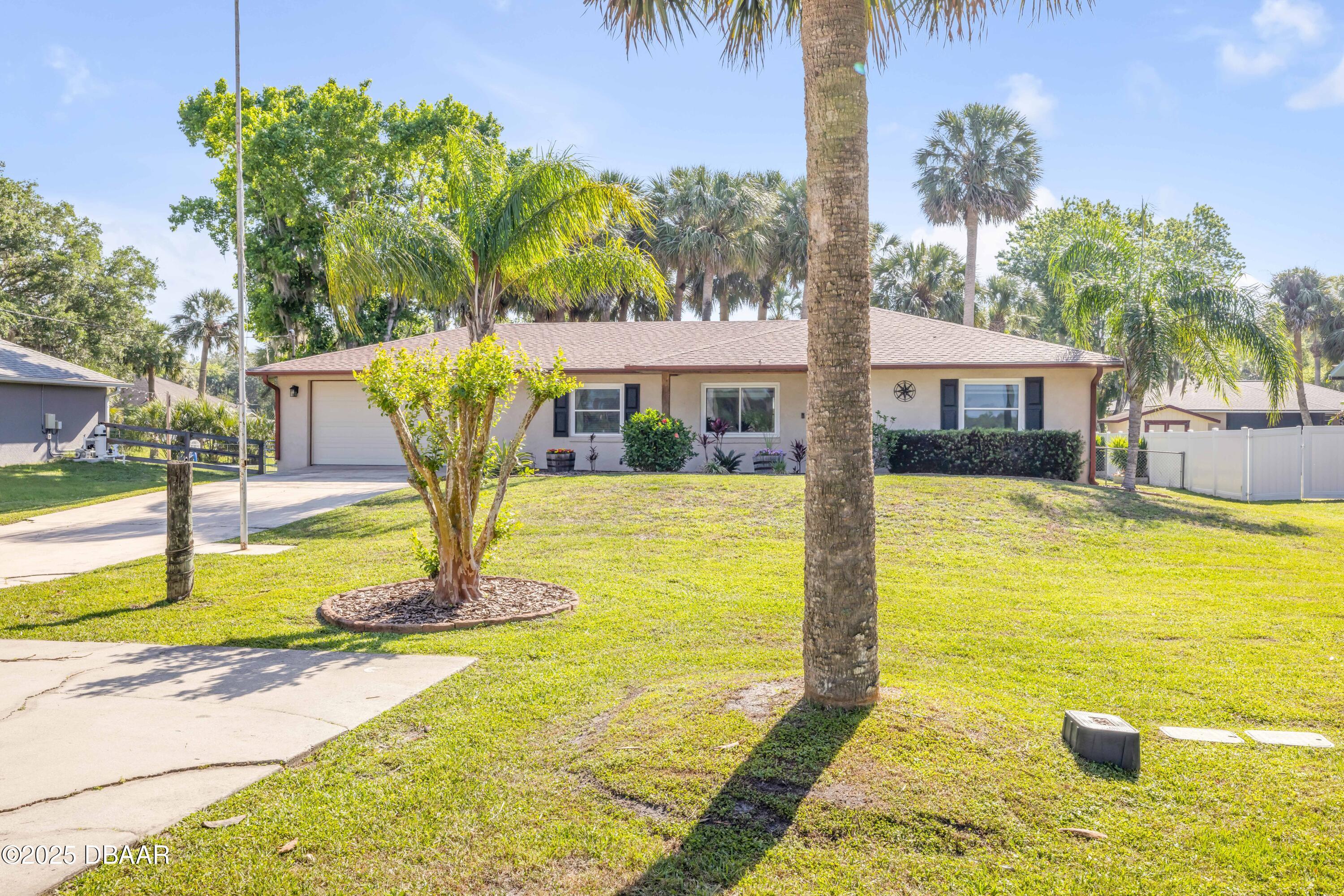 1617 Hontoon Road DeLand, FL 32720 - Photo 6 of 43 a view of swimming pool with palm trees
