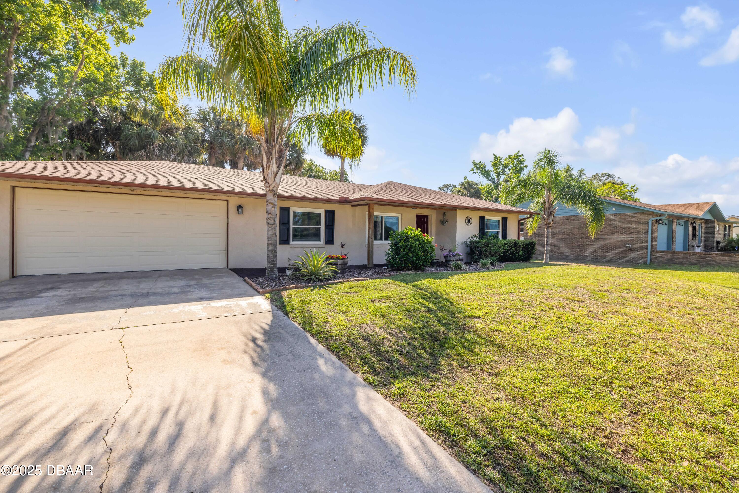1617 Hontoon Road DeLand, FL 32720 - Photo 7 of 43 a view of house with swimming pool outdoor seating