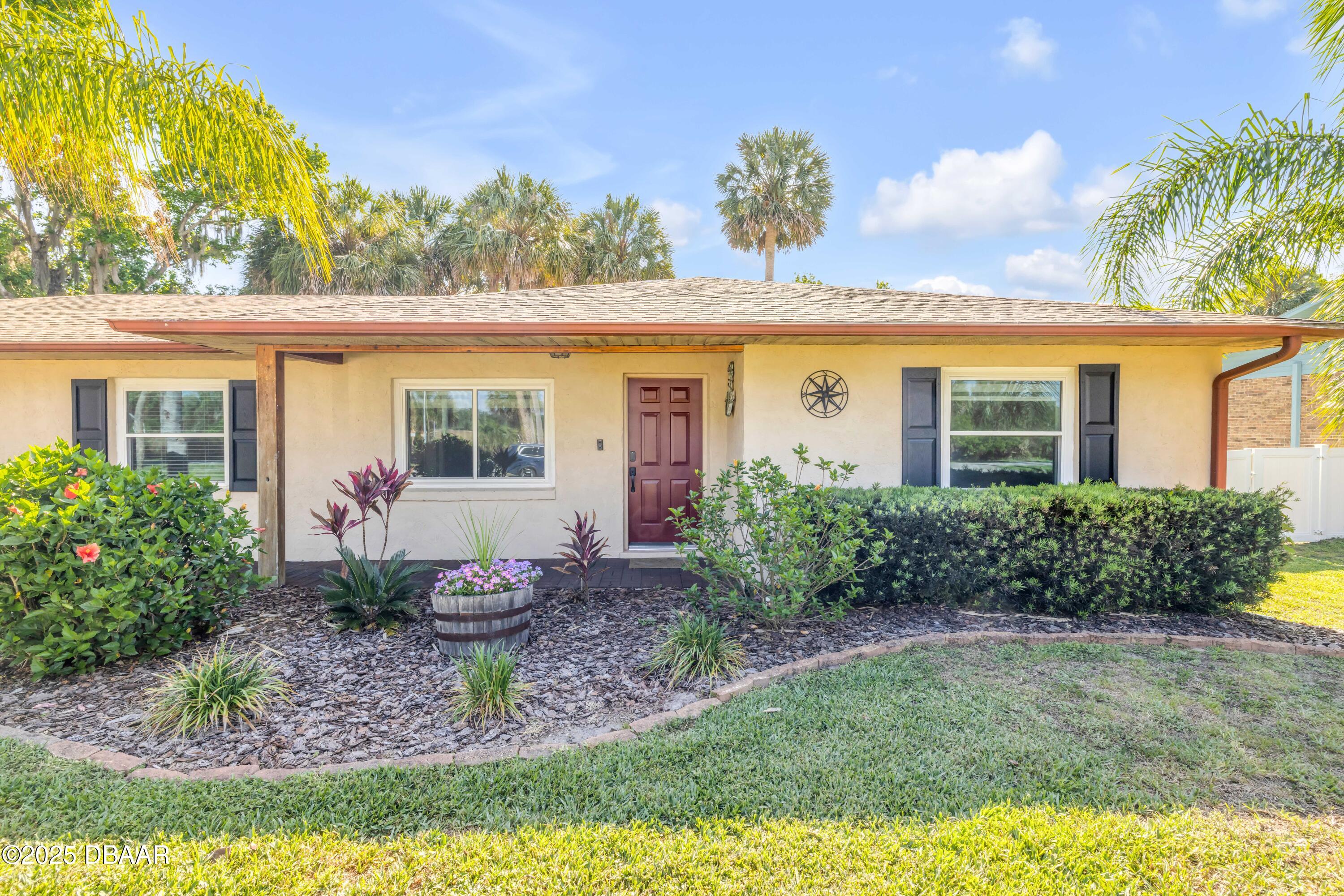 1617 Hontoon Road DeLand, FL 32720 - Photo 9 of 43 a view of a house with backyard and garden
