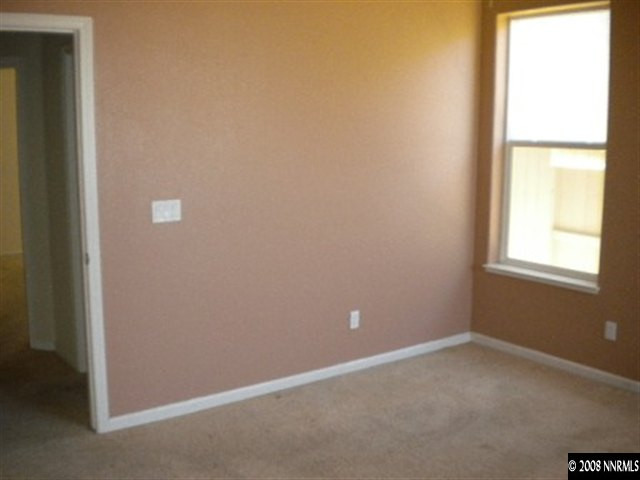 1607 Sewell Drive Reno, NV 89521 - Photo 8 of 8 an empty room with a window