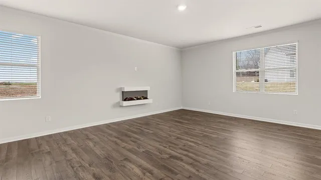 an empty room with windows