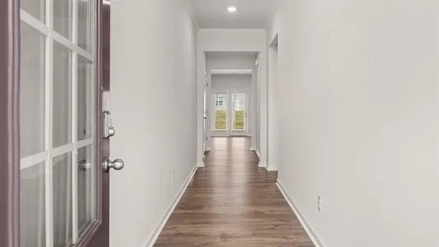 a bathroom with a sink a mirror and a vanity