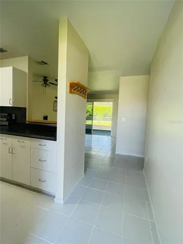 a view of an empty room and window