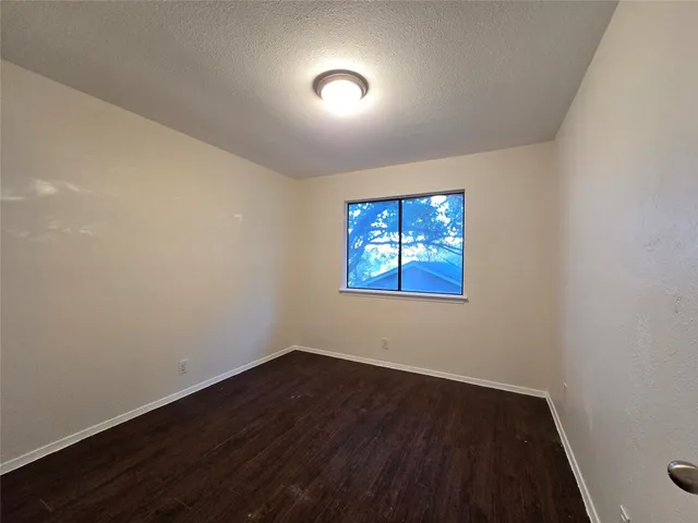a bathroom with a sink toilet and mirror