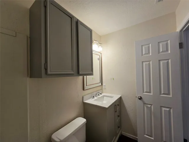 a view of a door and a window