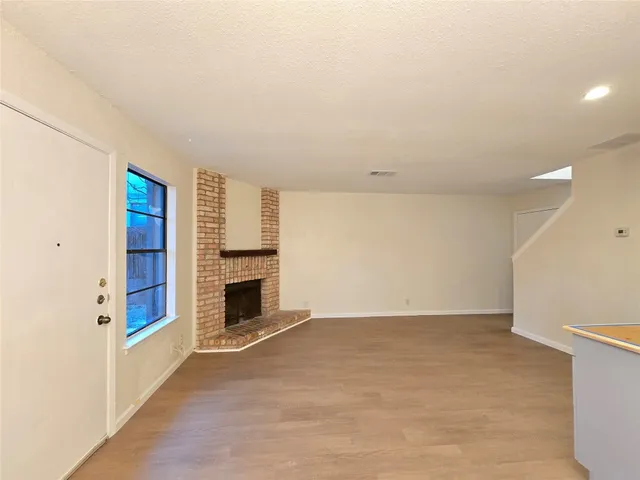 a kitchen with stainless steel appliances a refrigerator and a stove
