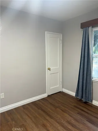 a bathroom with a sink mirror and a shower